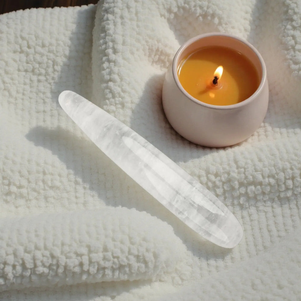 Clear quartz crystal pleasure wand by Venus, featuring a smooth, translucent design for clarity and light.