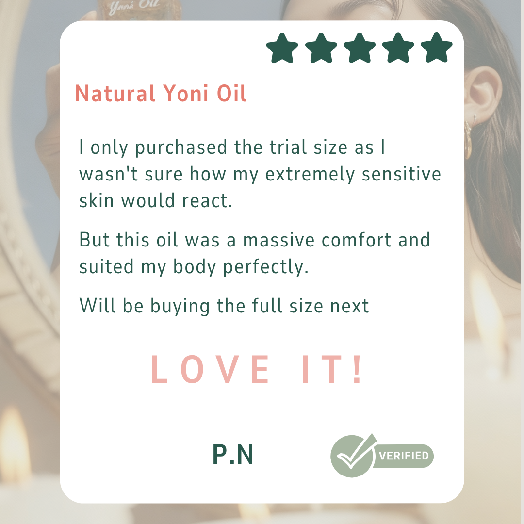 Phone screen displaying a product review for Natural Yoni Oil with a hand holding the oil bottle. Gaiae.Yoni_oil_customer_review. I only purchased the trial size as I wasn't sure how my extremely sensitive skin would react. 

But this oil was a massive comfort and suited my body perfectly. 
Will be buying the full size next love it 