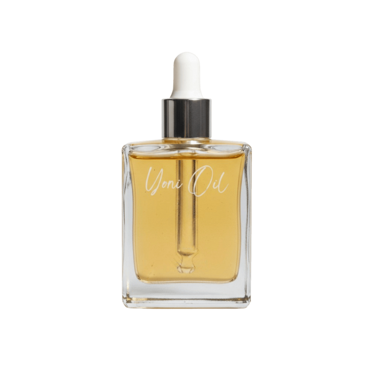 Clear glass bottle with dropper labeled 'Yoni Oil' on a white background Gaiae_Natural_Yoni_oil_Vulva_Oil