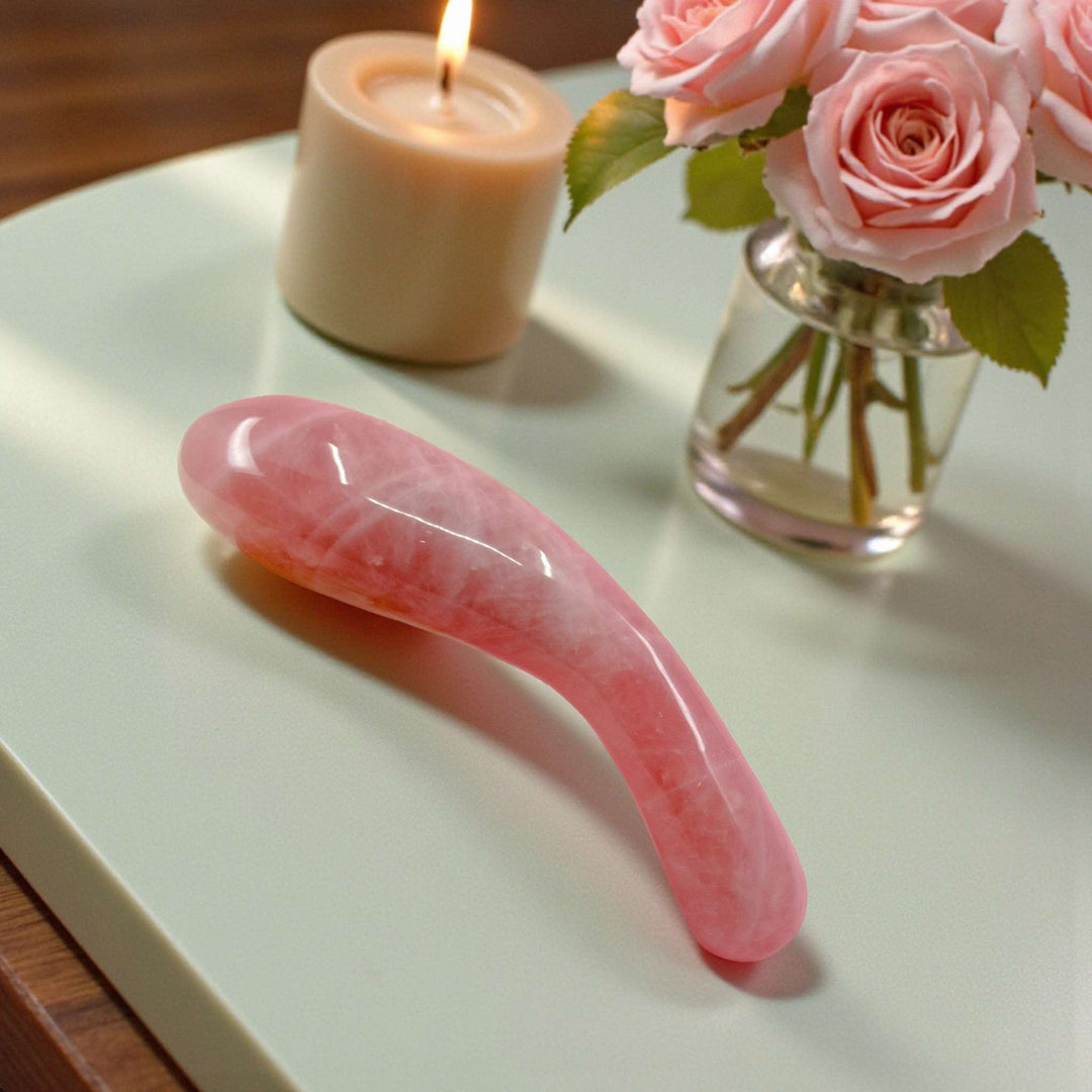Gaiae Rose Quartz Dildo • Earth Love & Healing Gaia Crystal Wands  green marble table, candles and flowers