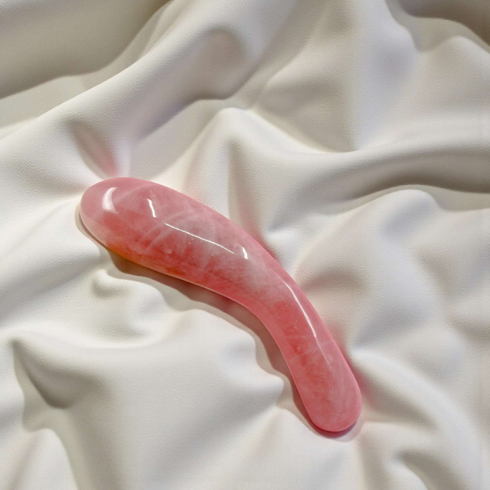 Gaiae Rose Quartz Dildo • Earth Love & Healing Gaia Crystal Wands  white bedding