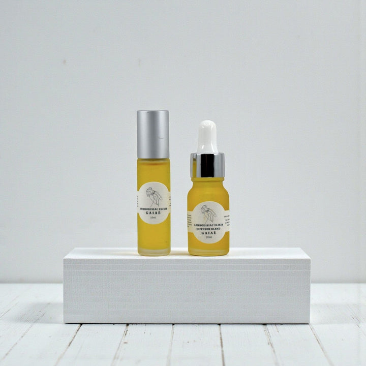 Gaiae Aphrodisiac Diffuser Blend  aphrodisiac essential oils• Open Heart. Sacred Seduction white table, and wall