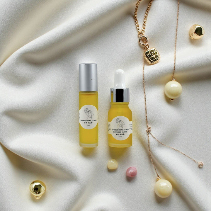 Gaiae Aphrodisiac Oils Aphrodisiac Diffuser Blend aphrodisiac essential oils • Open heart. Sacred seduction set of 2 on cream fabric and botanicals scattered