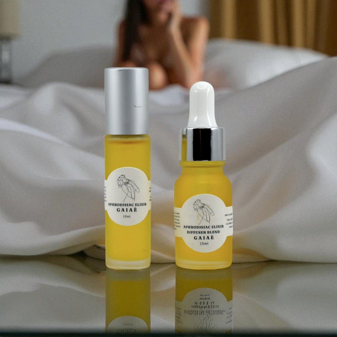Gaiae Aphrodisiac Oils Aphrodisiac Diffuser Blend aphrodisiac essential oils • Open heart. Sacred seduction background is white bedding and lady 