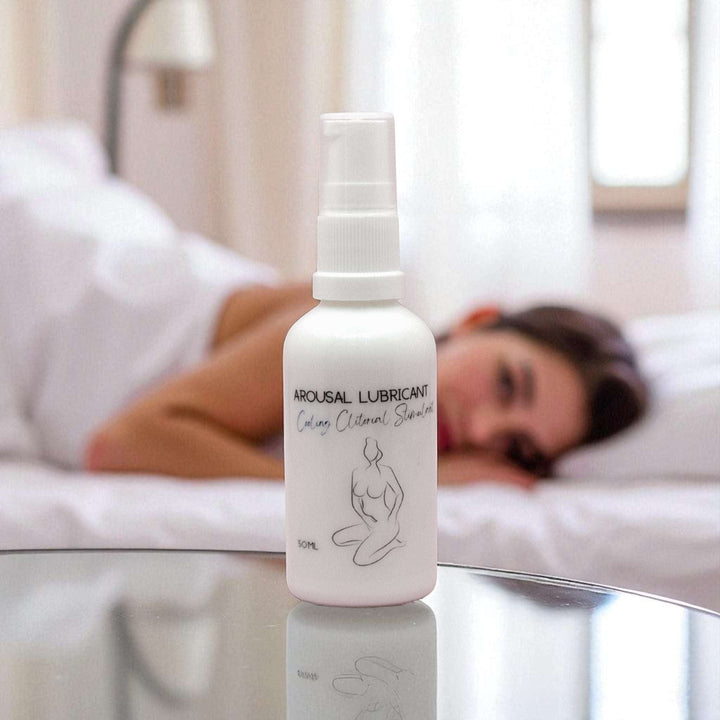 Gaiae Clitoral Arousal Oil  Warming & Cooling Arousal Lubricant. lady in background on bed breathless