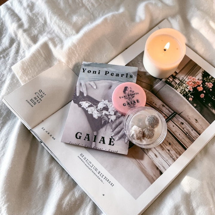 Gaiae Yoni Pearls on neutral background, small flower 